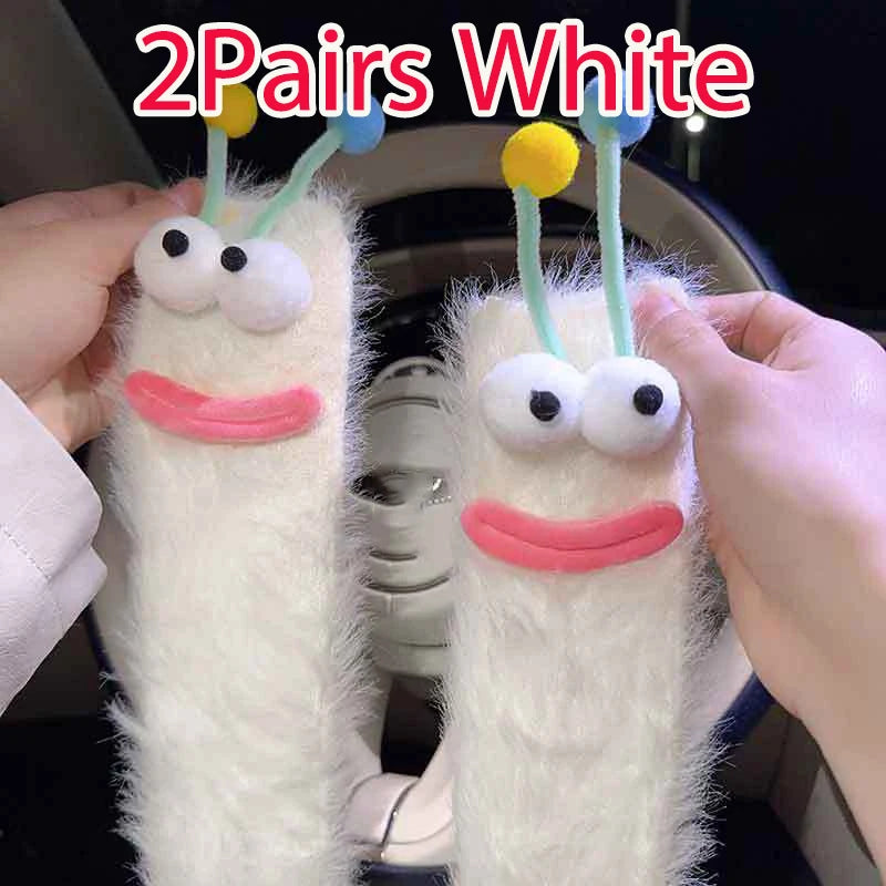 Funny monster fleece winter socks in white, featuring cute eyes and antennae for a fun and cozy winter experience.